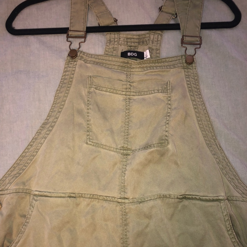Olive green loose fitting overalls